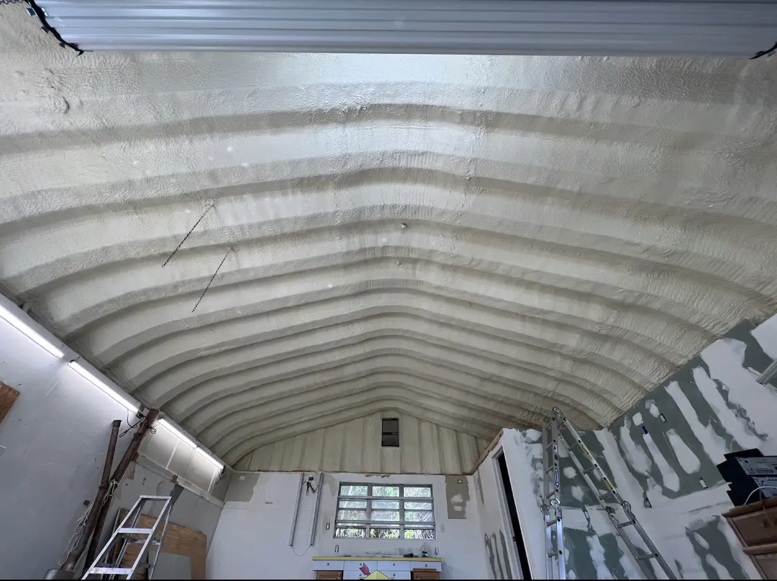 Spray polyurethane foam applied to the underside of a metal roof deck in Downingtown